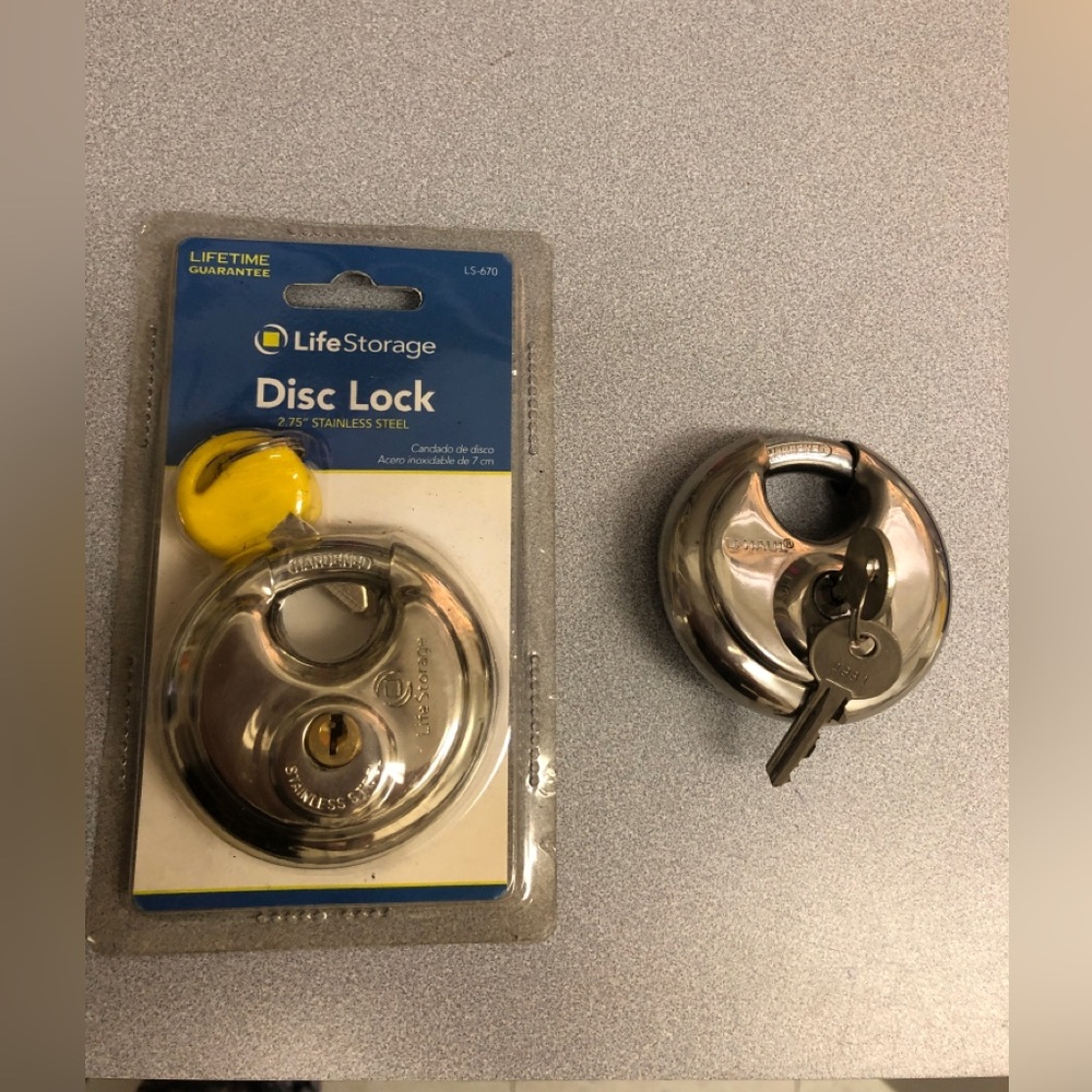 Disc Locks for Storage unit. 1 Life Storage,  one from Uhaul. Set of two locks